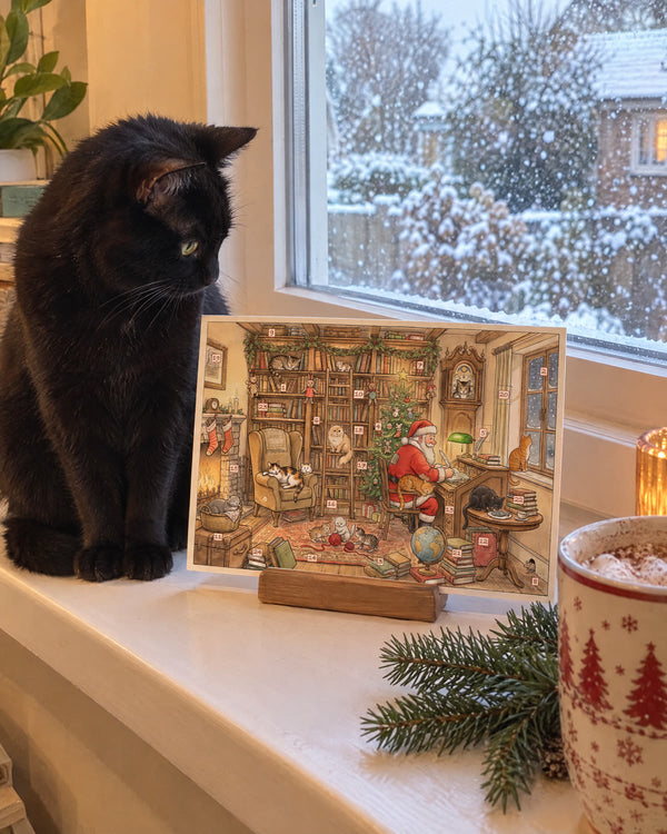 On the windowsill — Literary Cats advent calendar card at home