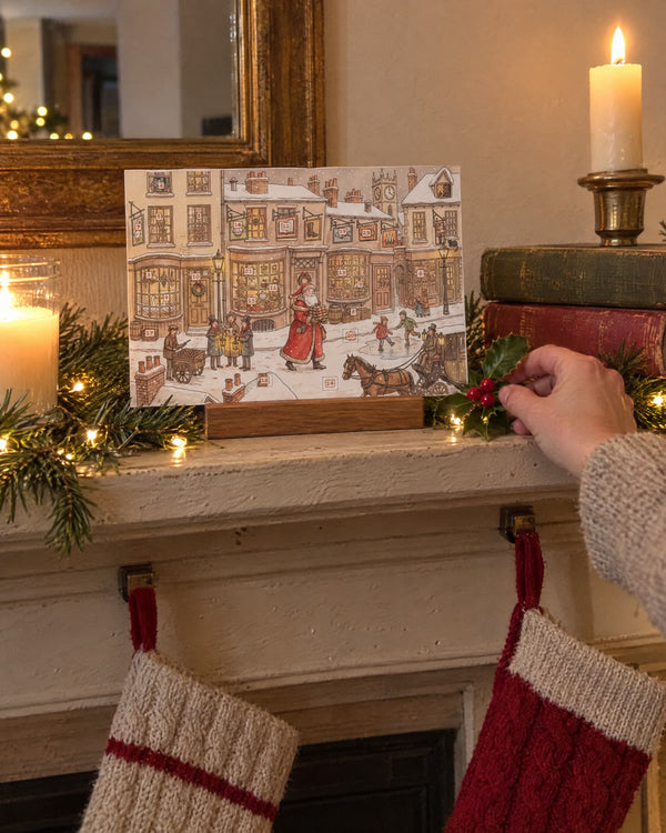 On the mantel — Dickensian Christmas advent calendar card at home